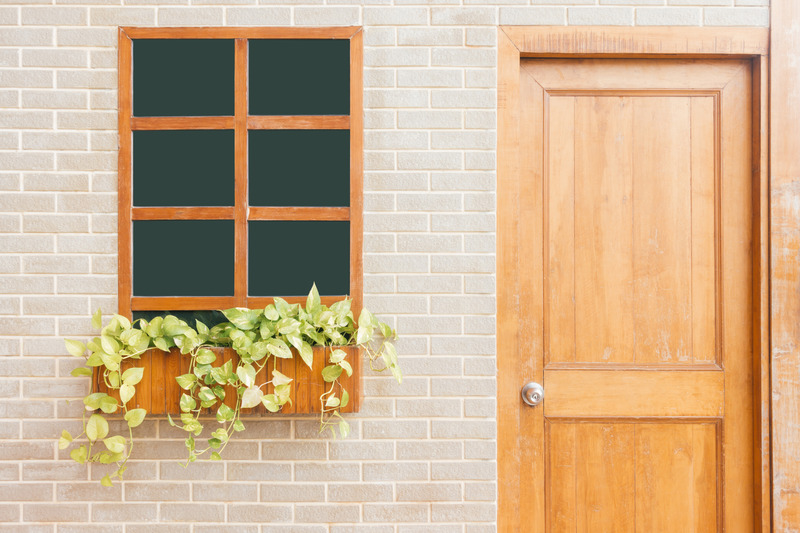 https://www.handymanconnection.net/mississauga/wp-content/uploads/sites/66/2020/05/Canva-Photo-of-Wooden-Door-Near-Window.jpeg