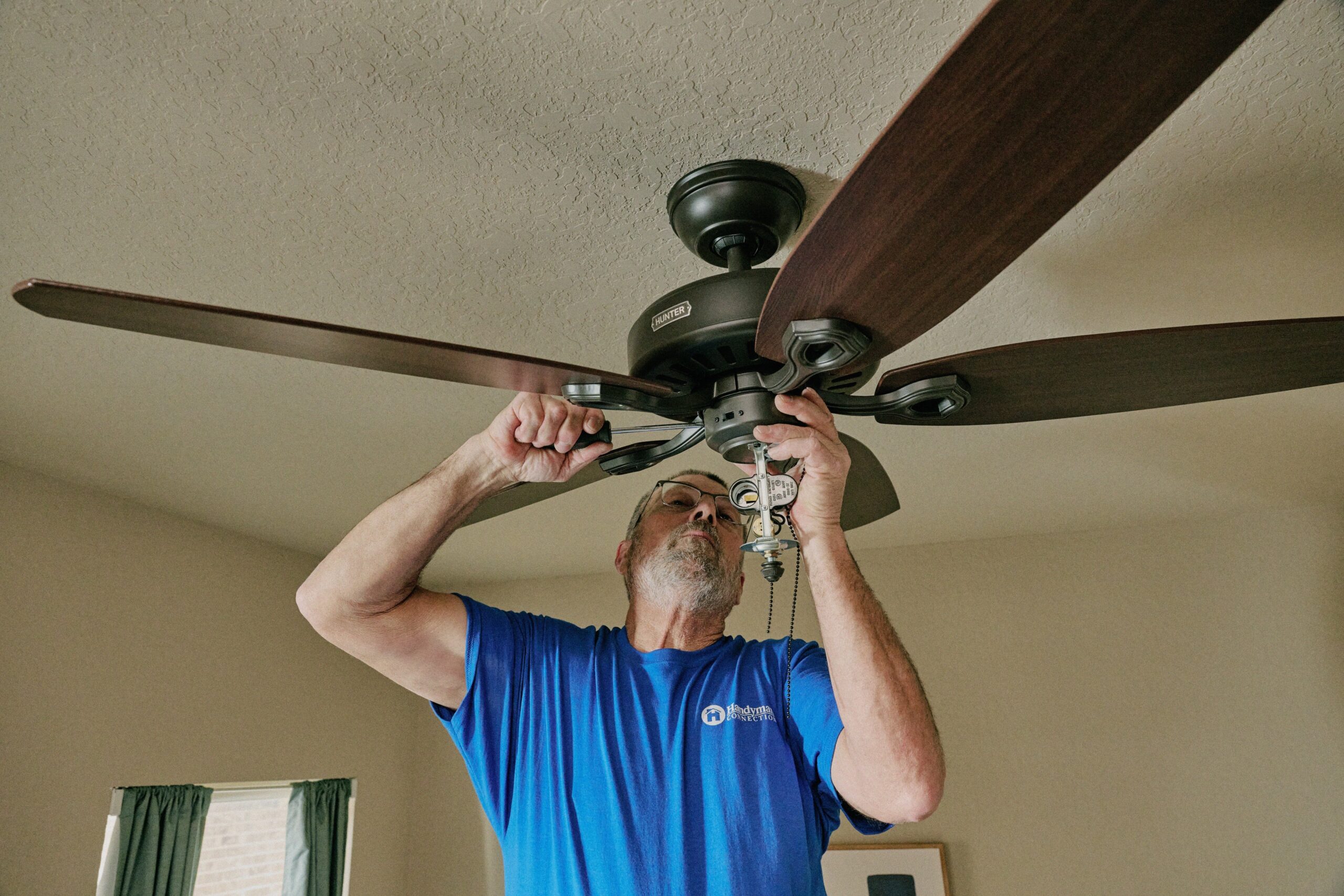 https://www.handymanconnection.net/wp-content/uploads/2024/10/Ceiling-Fan_1049-H-scaled.jpg